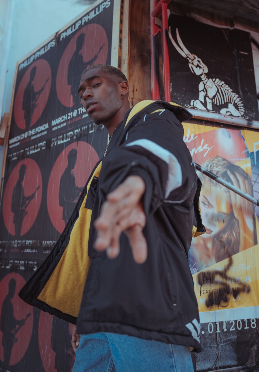 Look 03 — Yellow black jacket, poster wall