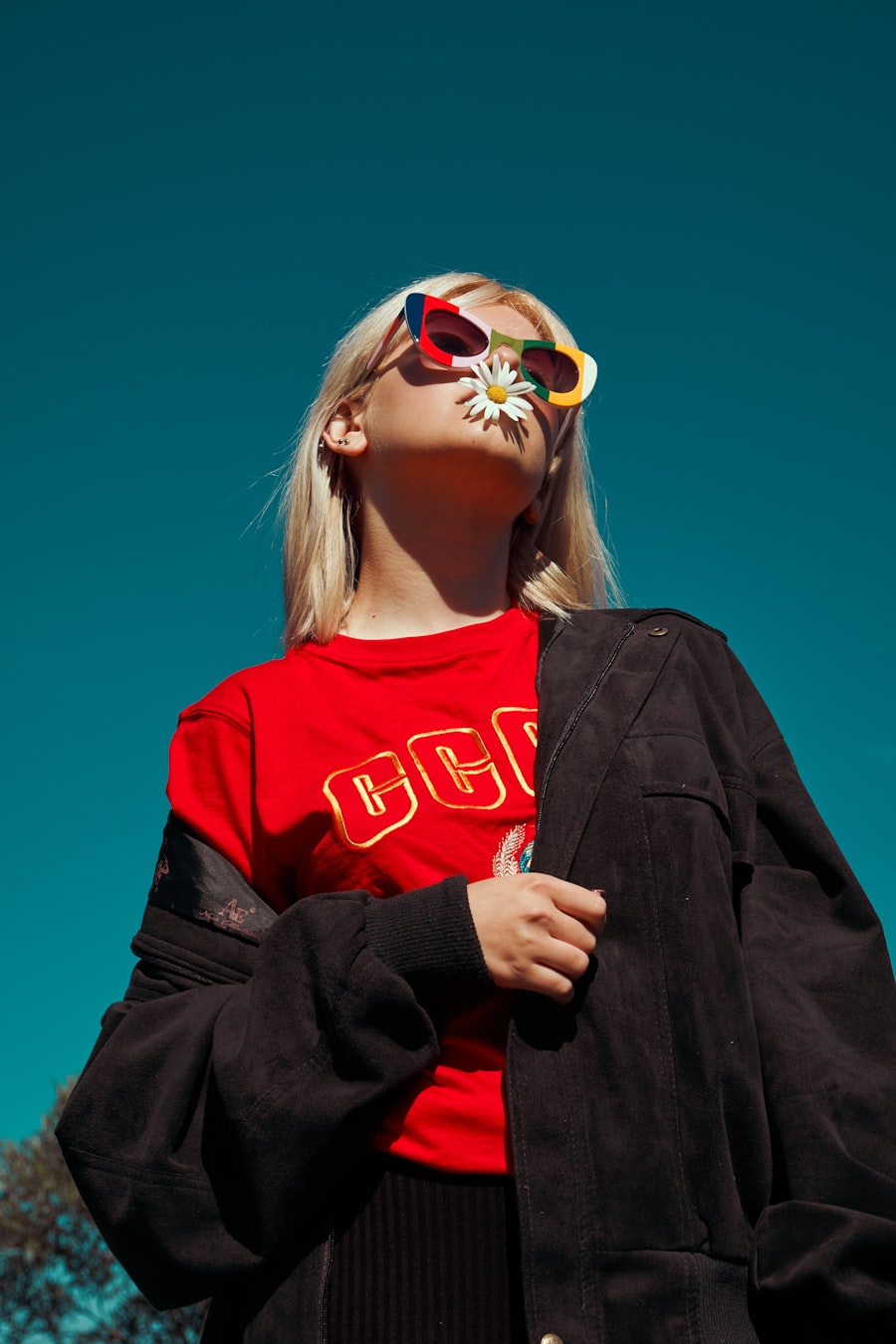 Look 02 — Signal red tee and black jacket